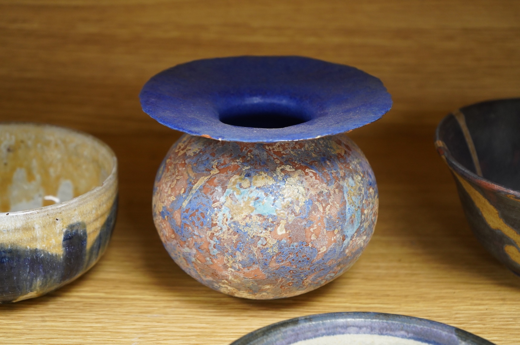 A collection of studio pottery to include crystalline glazed works by Stephen R Jones Des, Brighton, vases and a pair of dishes, largest 22cm high